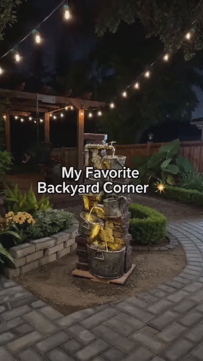 FountJoy 3-Tier Rustic Rock LED Outdoor Water Fountain with warm-toned built-in lights, polyresin construction featuring a natural rock cascade design. Three tiers deliver flowing water for garden, patio, and backyard decoration day and night.