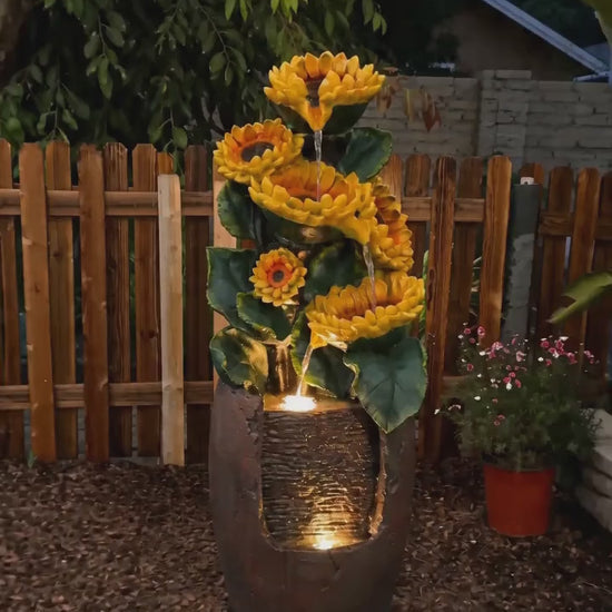 FountJoy sunflower fountain bringing joy and natural beauty to your garden. Water cascades past cheerful sunflower accents while LED lights create a warm evening glow — a delightful backyard fountain that celebrates the spirit of outdoor living.