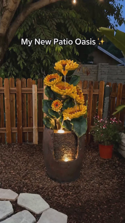 FountJoy sunflower fountain bringing joy and natural beauty to your garden. Water cascades past cheerful sunflower accents while LED lights create a warm evening glow — a delightful backyard fountain that celebrates the spirit of outdoor living.